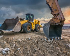 Earth moving by a bulldozer in the construction of a road in Spain.